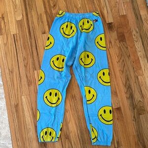 Aviator Nation smiley face sweatpants in blue. Size Medium NWT
